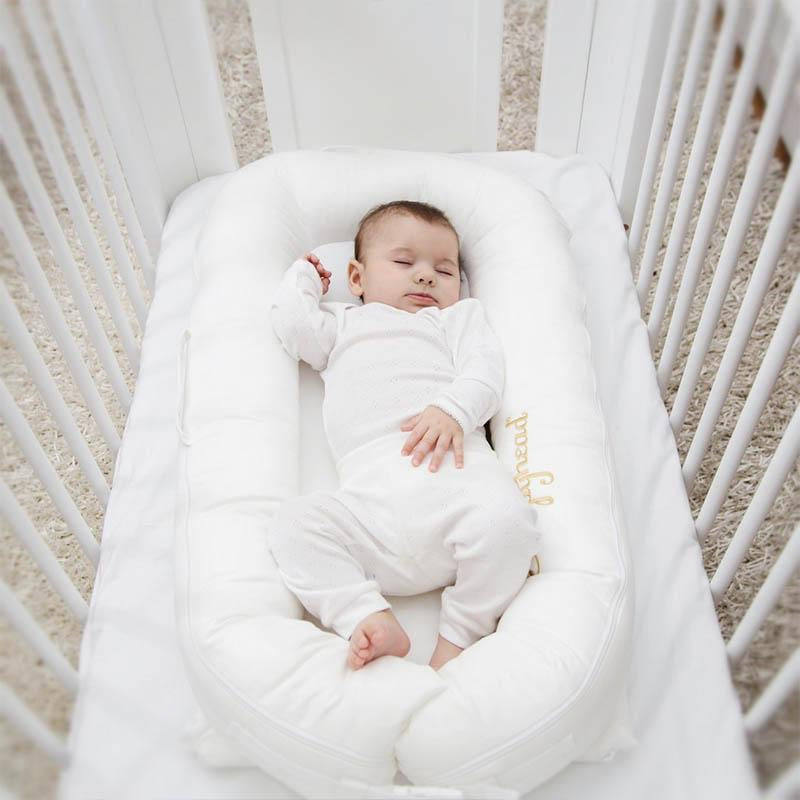 Sleep Positioners: What You Need to Know - Natural Baby Shower
