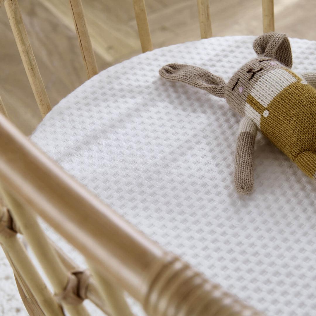 CuddleCo Aria Wave Crib Rattan1