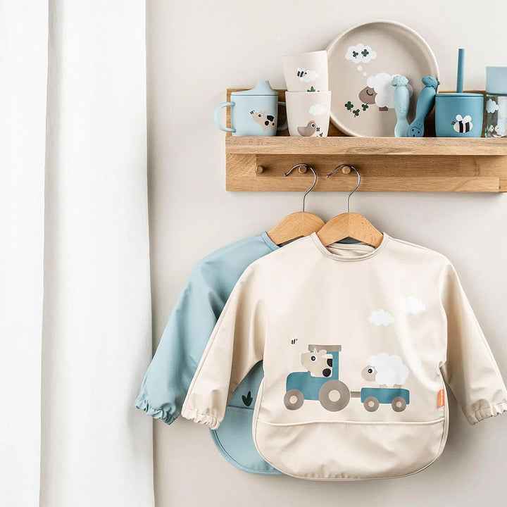 Done by Deer Sleeved Pocket Bib - Tiny Farm Sand-Bibs-Tiny Farm Sand-6-18m | Natural Baby Shower